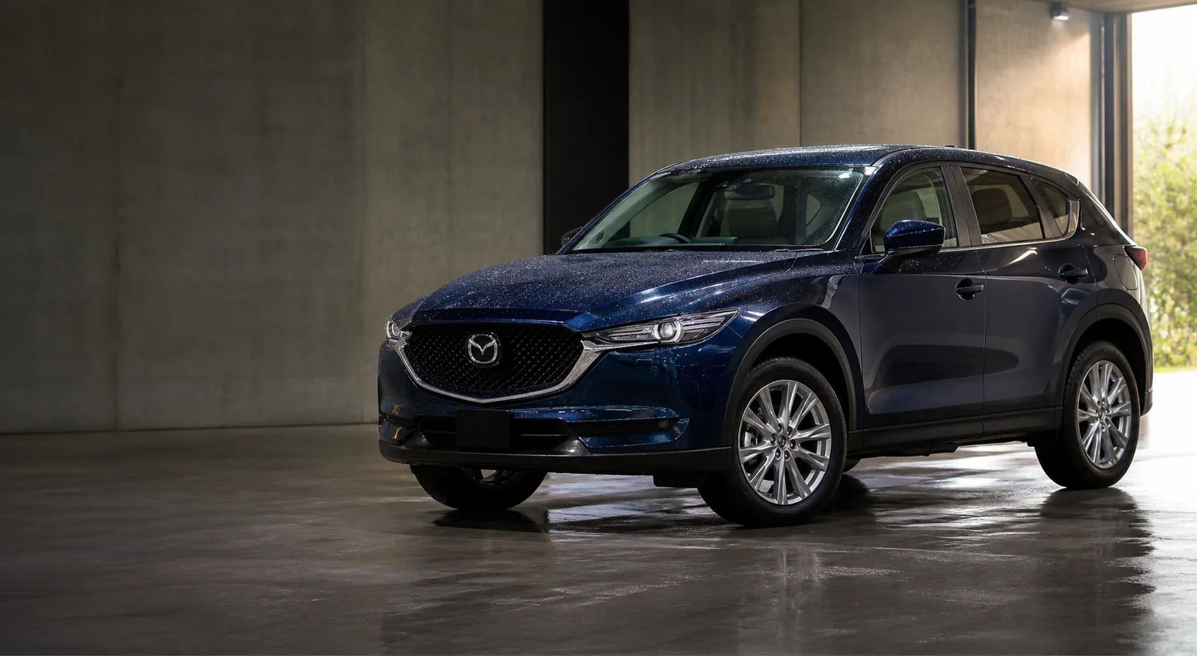 Freshly detailed deep-blue Mazda CX-5 family SUV